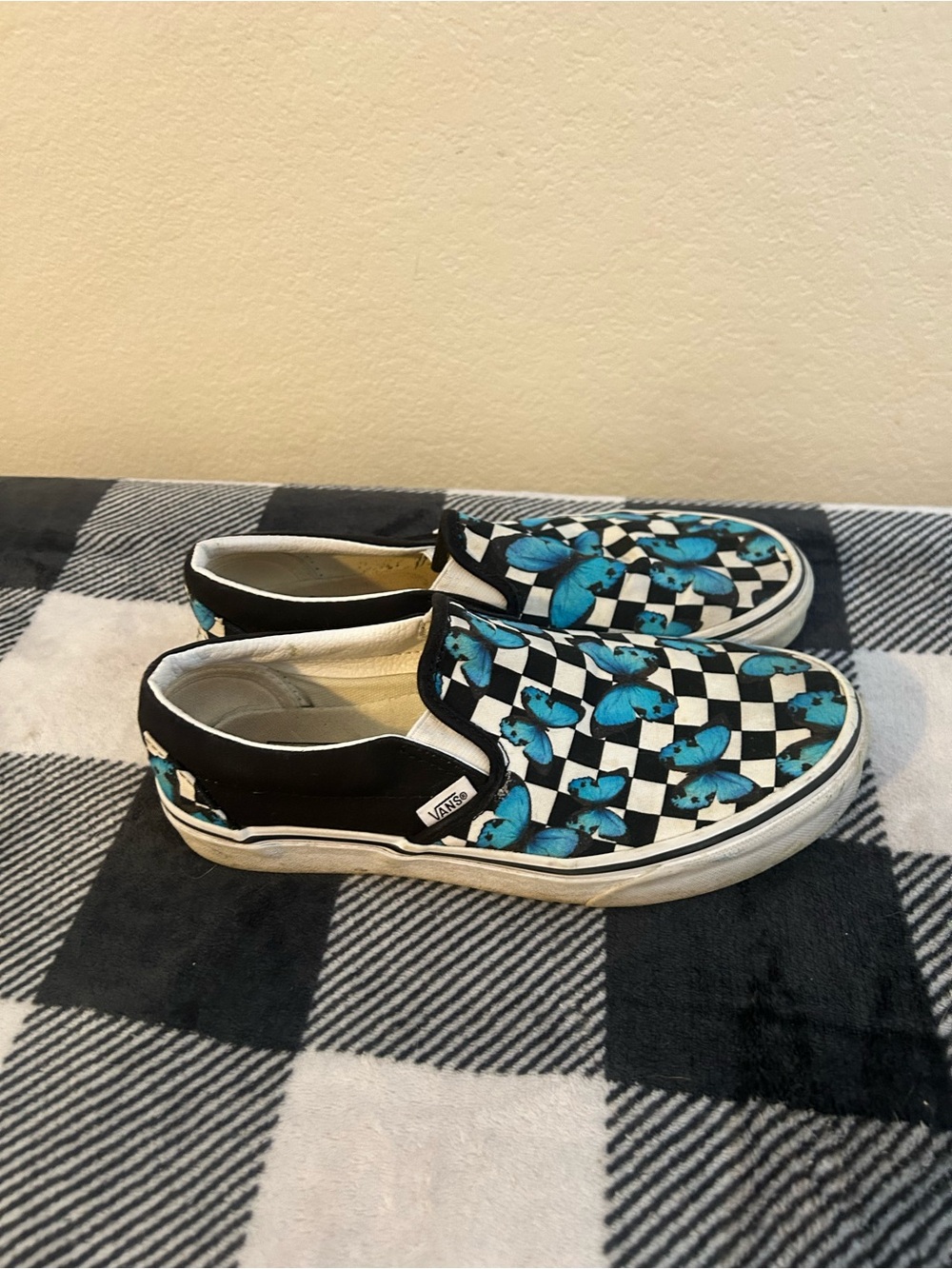 Vans Black & White Checkerboard Slip-Ons with Blue Butterfly Motif 8.5